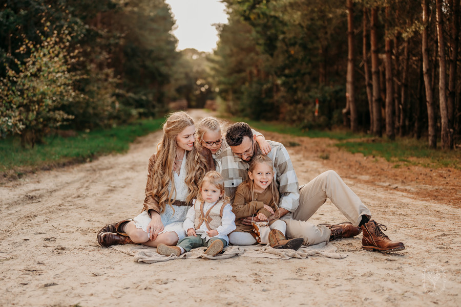 Gezinsfotoshoot Friesland gezin fotoshoot familie portret Flevoland strand bos
